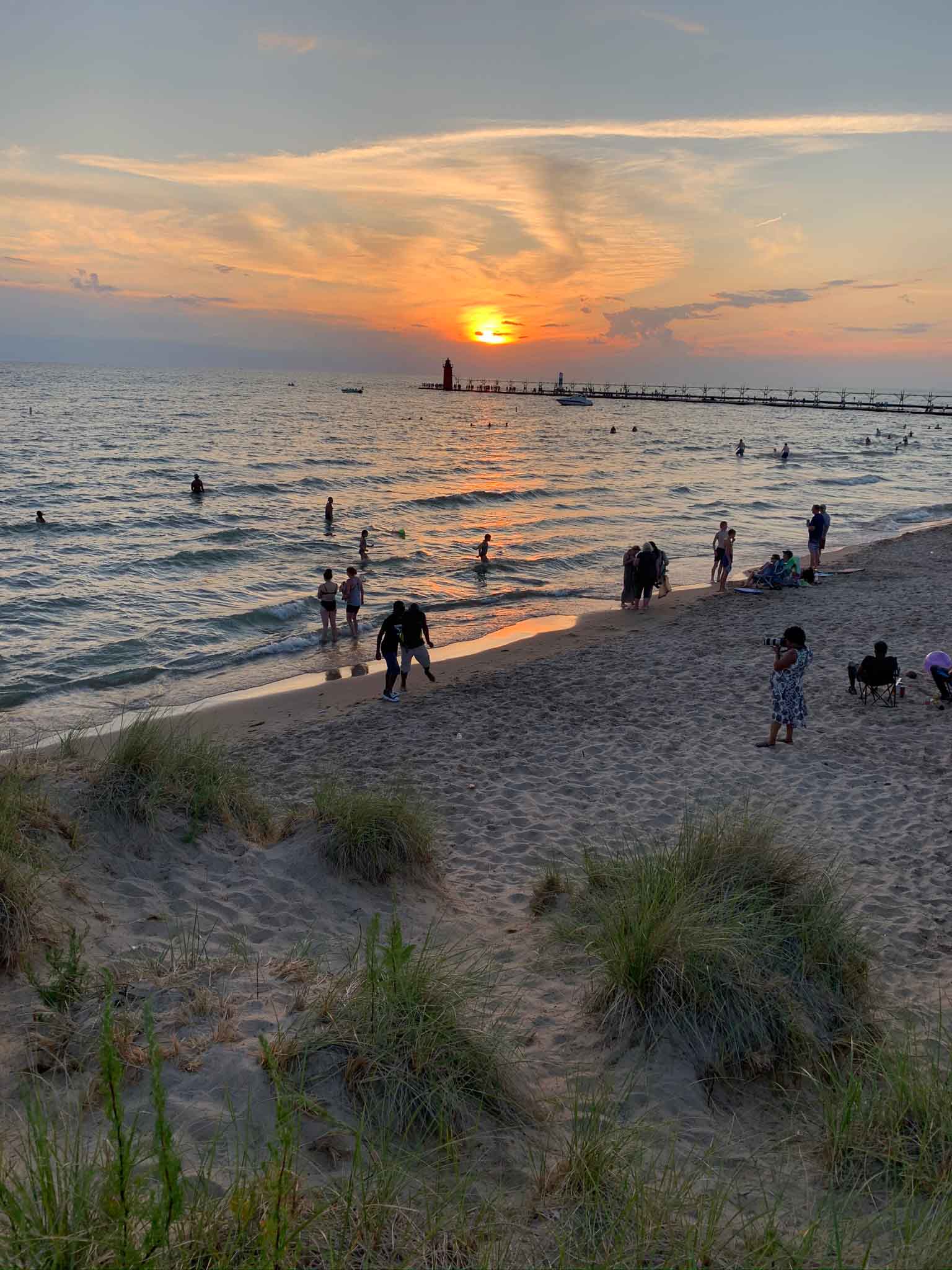 Sunset shot with the beach and travelers on it