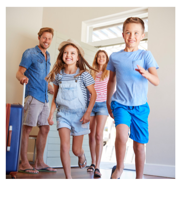 Family arriving to their vacation home