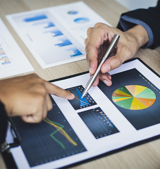 Partners looking over statistics and data