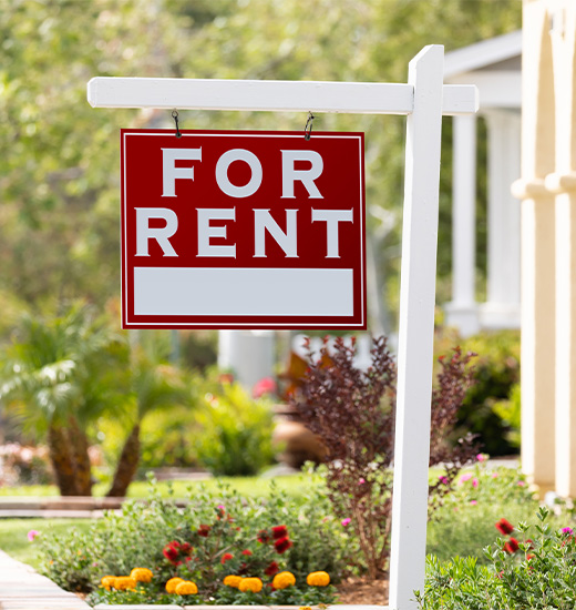 For rent sign in a front yard